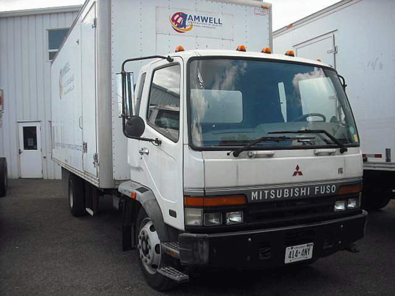 Кабина фусо файтер. Mitsubishi Fuso FK. Мицубиси Фусо fk728h540284. Кабина Mitsubishi Fuso Canter FK. Mitsubishi Fuso 2001 us-spec.