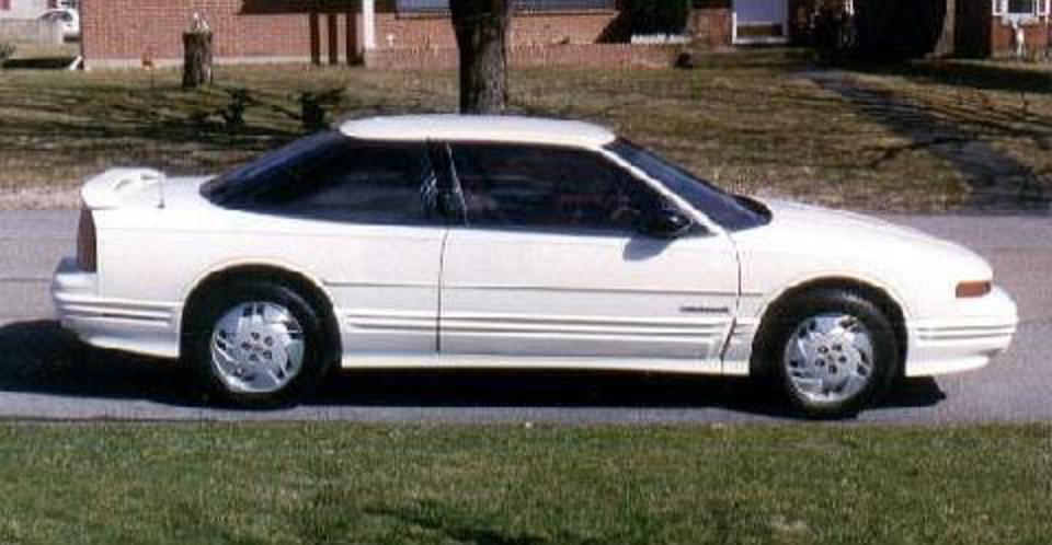 Oldsmobile Cutlass Supreme SL Coupé Blanc SVr (1992) - Voir la photo.