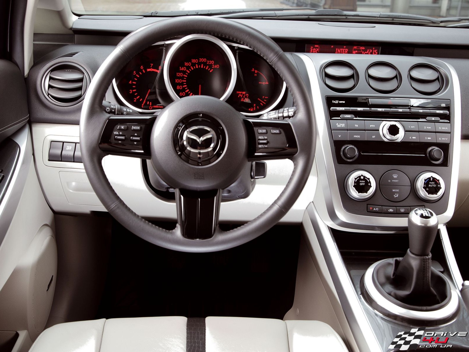 Vue de la Mazda CX-7 2.3. Photos, vidéo, fonctionnalités et réglage de...