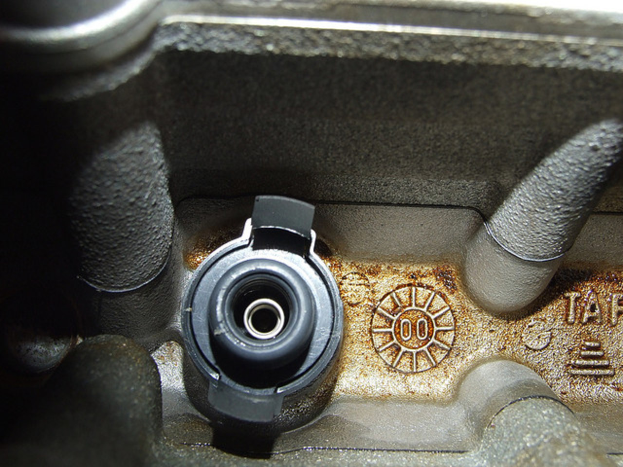 Guide de changement de bougie d'allumage Oldsmobile Alero (GM) 2,4 L: IDI / Flickr...