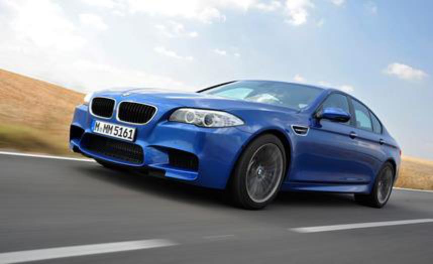 2013 BMW M5. Avec sa nouvelle berline haut de gamme, la division M continue de faire pencher la balance